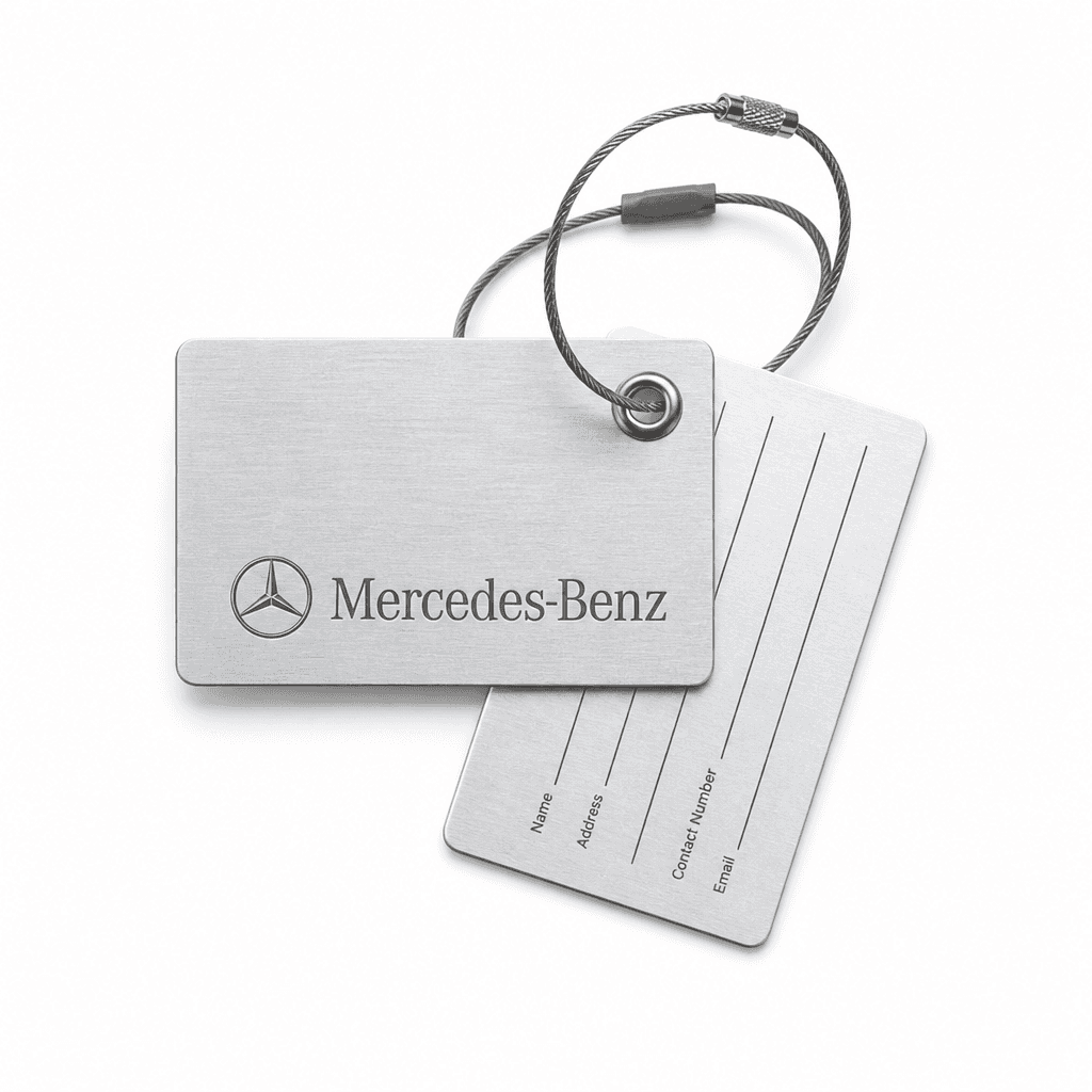 Brushed-aluminium Mercedes-Benz luggage tag with debossed three-pointed star — designed and made by Sense2.
